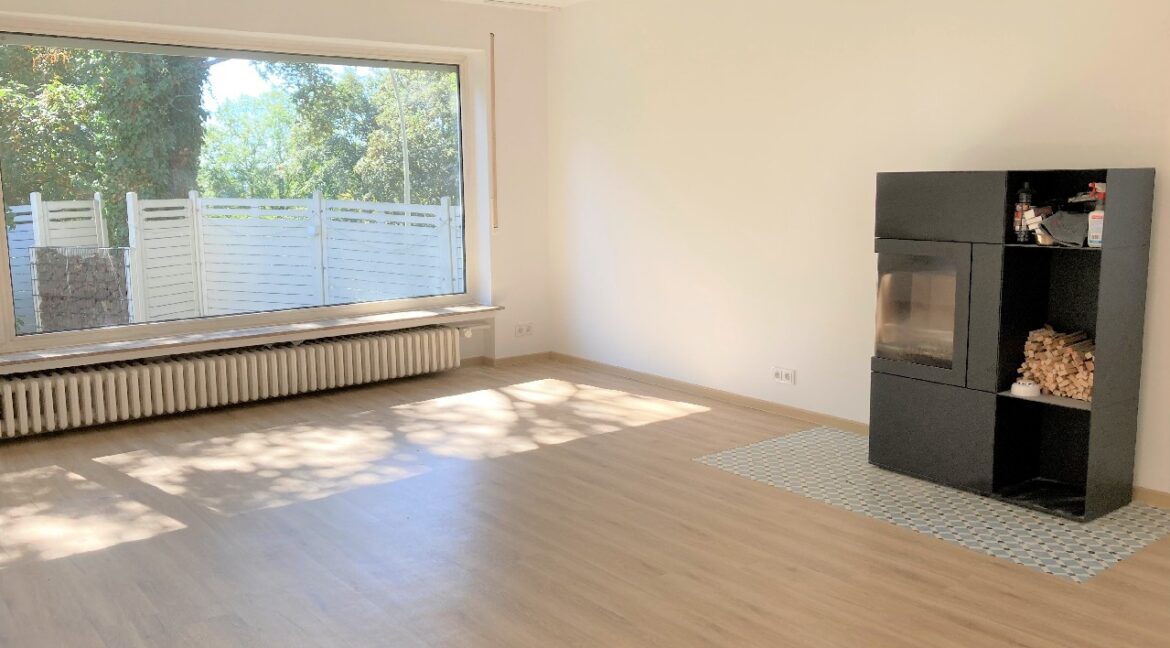 Wohnzimmer mit Kamin